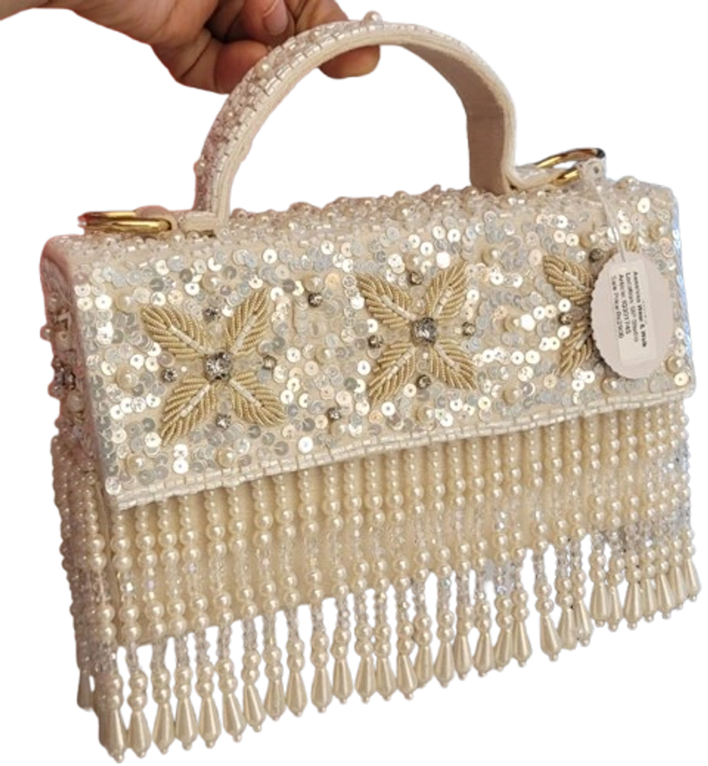 Handcrafted ivory wedding clutch with premium white sequin work, flower embroidery & pearls. ₹2900