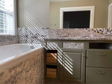 HORIZON WHITE GRANITE VANITIES AND BATHTUB SURROUND