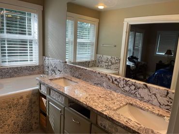 HORIZON WHITE GRANITE VANITIES AND BATHTUB SURROUND