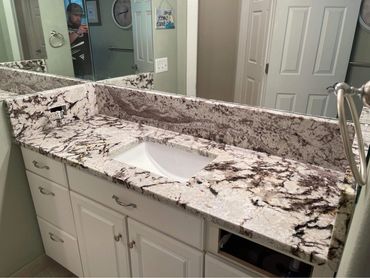 HORIZON WHITE GRANITE VANITIES AND BATHTUB SURROUND