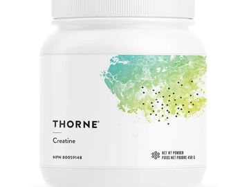 Thorne Creatine supplement container with green and blue design.