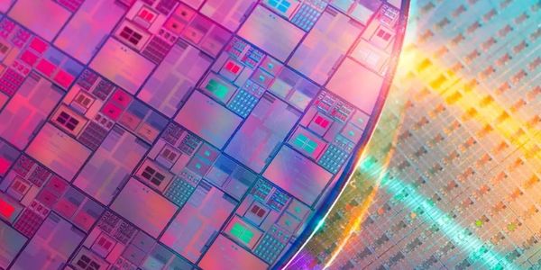 Close-up of colorful microchips on silicon wafers.