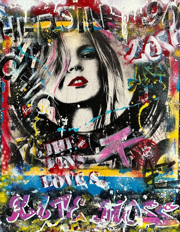 Graffiti art featuring a woman's face with bold colors and abstract text.