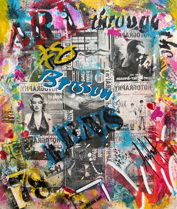 Colorful graffiti art featuring Marilyn Monroe and layered text on newspaper.