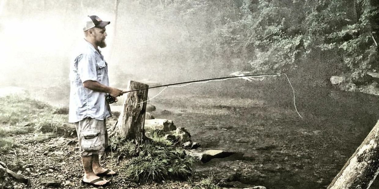 Fishing a small creek off the Norfork Dam in Arkansas. 