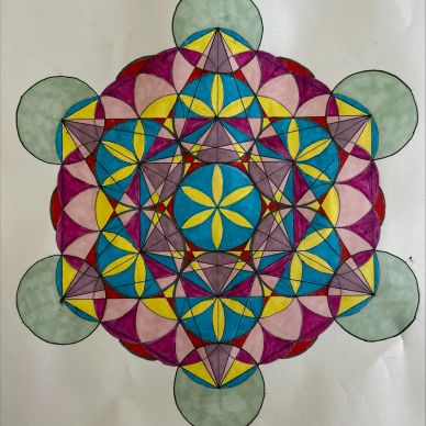 Colorful geometric mandala with blue, yellow, purple, red, and green.