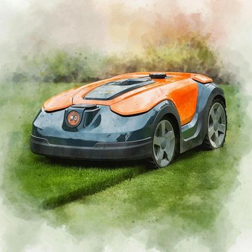 An orange and gray robotic lawn mower on green grass.