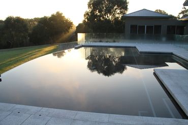 Bluestone paving around infinity pool Beaconsfield Upper