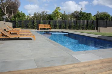 Bluestone Paving and Spotted Gum Decking Pool Surrounds in Portsea