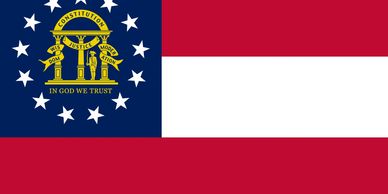 The state flag of Georgia featuring the state seal with pillars and stars.