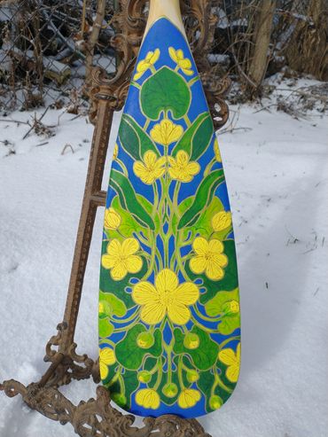 Painted paddle for auction in support of downtown Peterborough's gardens