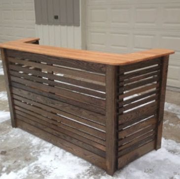 Wooden outdoor bar with a natural finish and slatted design.
