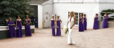 Bride and her bridesmaids posed classically