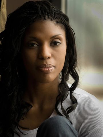 Window lit head shot of a beautiful model