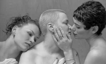 Evocative black and white image of three beautiful women