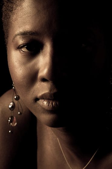 Beautiful African woman close-up with sepia tones