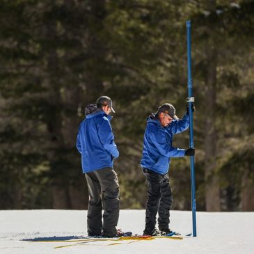 Scientists measure the annual snow pack in the Sierra Nevada mountains. Photo: Tahoe Daily Tribune. 