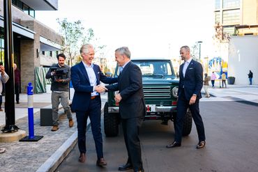Scout Motors CEO Scott Keogh shakes hands with NC Governor Josh Stein at Scout Motors announcement