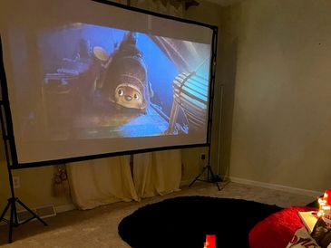 Movie night tents with a projector screen 