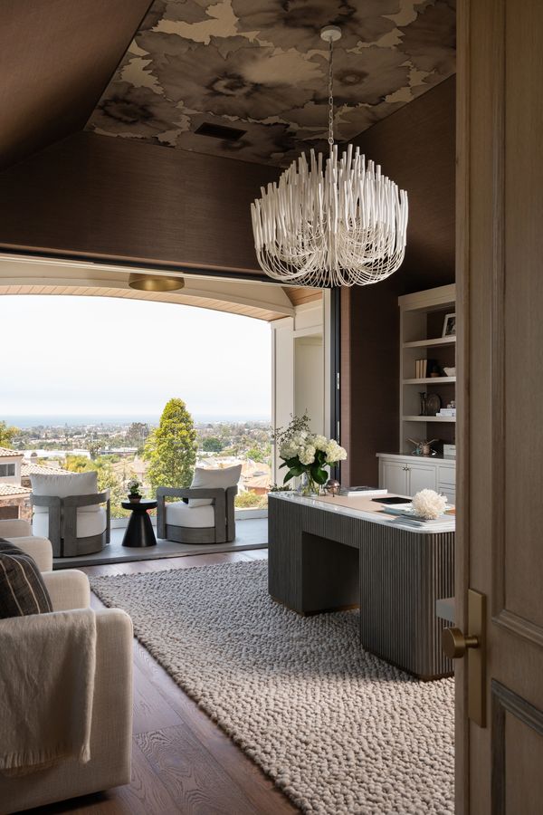 A luxurious master bedroom / primary suite designed by SK7 Architecture. Luxurious home architects.