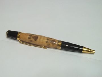 Gold titanium nitride with paw prints inlay.