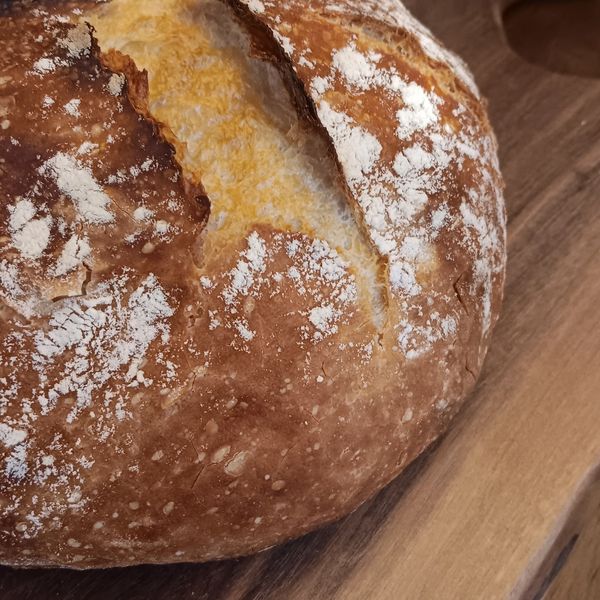 Homemade artisan bread on a charcuterie board