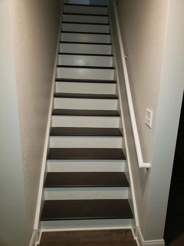 After image of a client's staircase with paint and finish.
