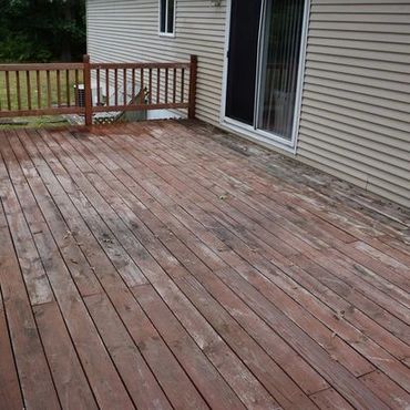 A client's dirty, fading deck prior to our services