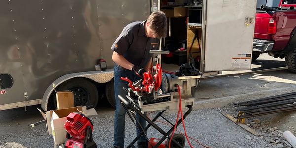 Logan learning the plumbing and gas trade