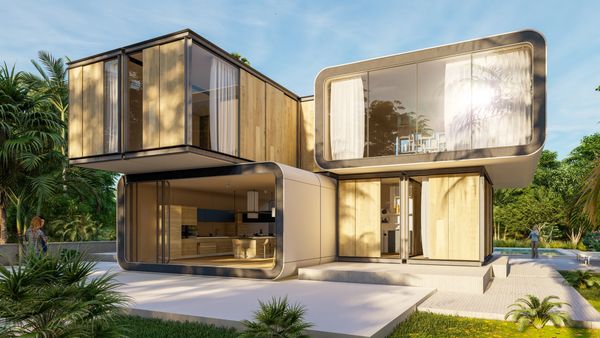 This image depicts a striking, modern modular home with a unique, futuristic design.