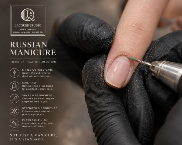 Close-up of a Russian manicure in progress with precision tools.