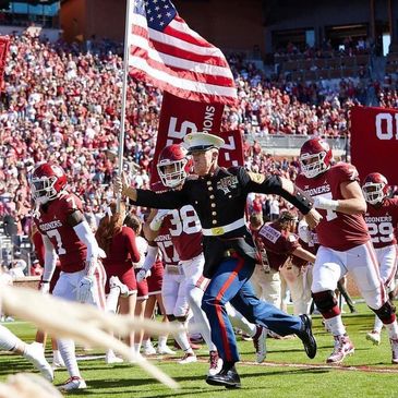 Marine Running with Flag 