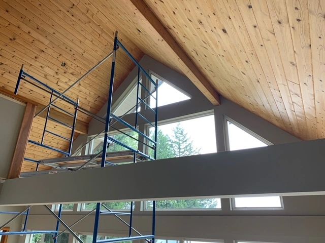 Client wanted to have the wood ceiling painted white to brighten up their space 