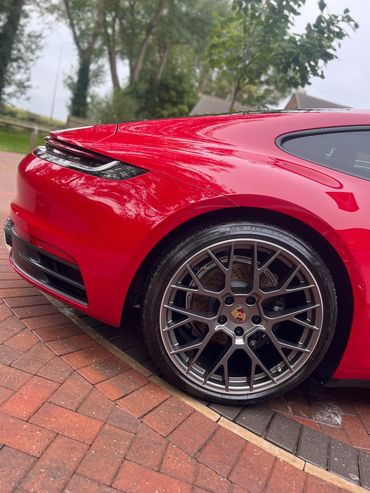 Red Porsche 911 carerra 