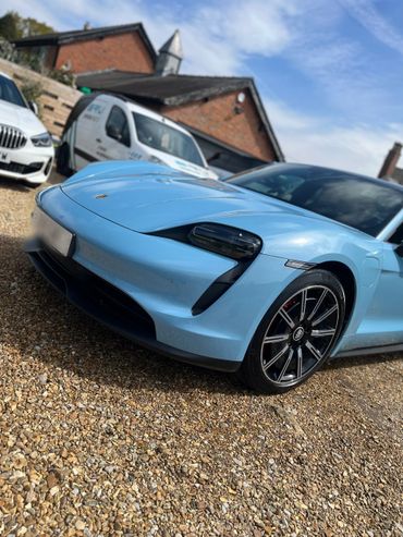 Blue Porsche Taycan after our maintenance valet 
