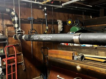 Cast iron is still the go to piping for most commercial building applications .