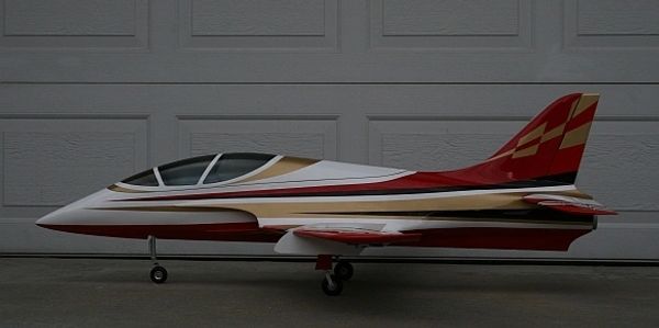 An RC jet with orange and white colors