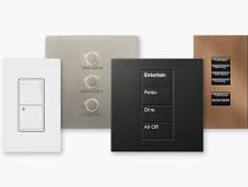A collection of modern light switches and control panels in various designs.