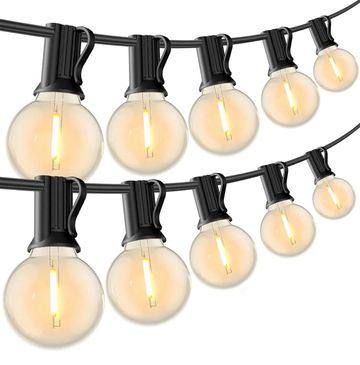 String of warm glowing outdoor globe lights with black clips.