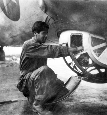 Staff Sergeant Albert "Al" Arreola with his B-17 "The Latest Rumor" 