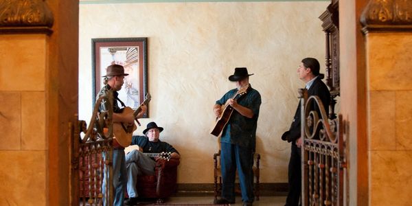 Billy Needs a Beard rehearsing and relaxing before a gig.  Photo credit Tony Guinn