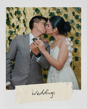 Couple kissing at their wedding.