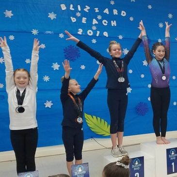Gymnasts on the podium at 2019 Blizzard Beach