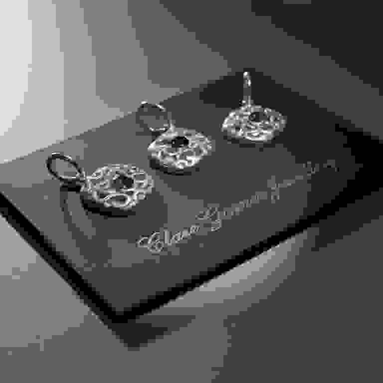 Three solid silver charms with CZ stones