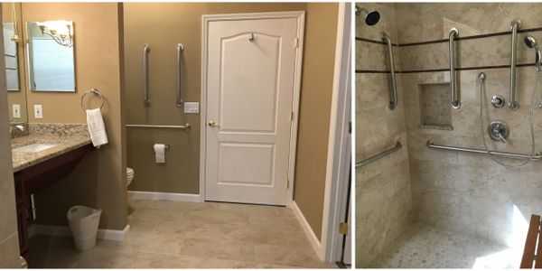 Safety grab bars through out the bathroom along with shower seat and multiple shower heads and hand held shower wand.