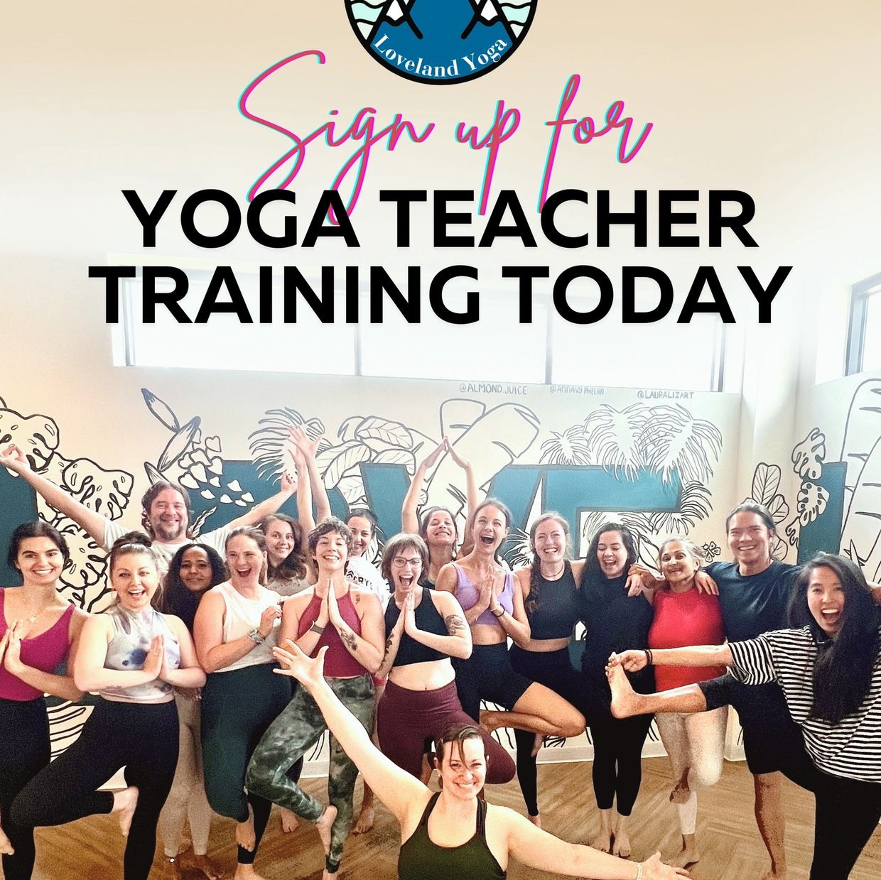 Group of yoga teacher trainees happy with their arms up
