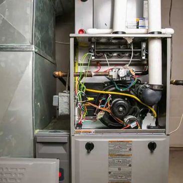 A furnace installed in the garage of the house.