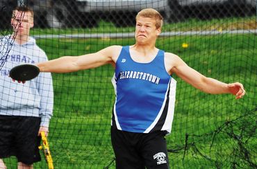 Hich school track and field, throwing the discus