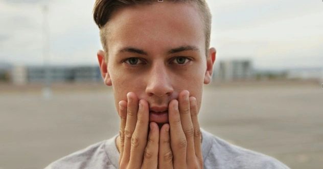 An anxious preoccupied man expressing anxiety.