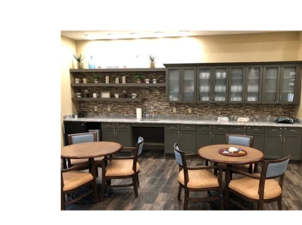 Shared dining area and kitchen at Everlasting Services at Estrella Center.